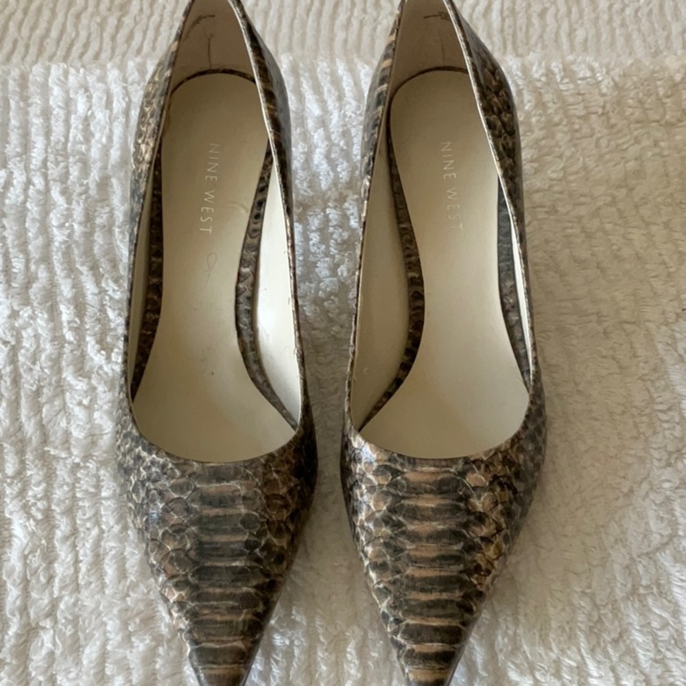 Nine West snake skin looking shoes.